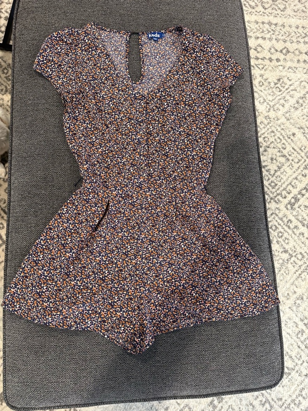 Keds Navy Floral Keyhole Romper with Rust and White Accents